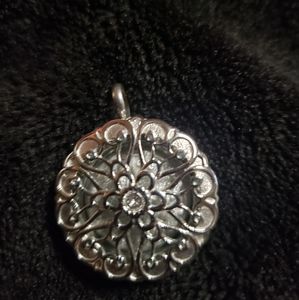 Origami owl twist locket.